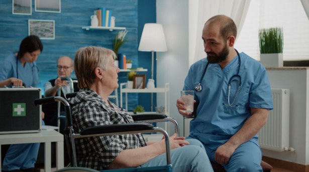 Senior receiving Memory Care Washington State support at the Adult Family Center of Moses Lake, compassionate assistance daily